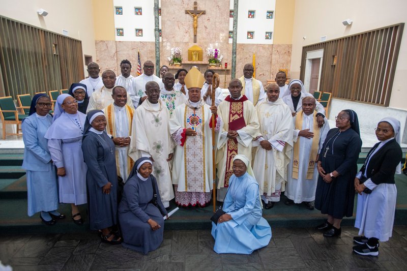 Cardinal Peter Ebere Okpaleke of Ekwulobia, Nigeria, poses with clergy and women religious following a special May 31, 2026 Mass at St. Eugene Church in South LA. (Michael Goulding)