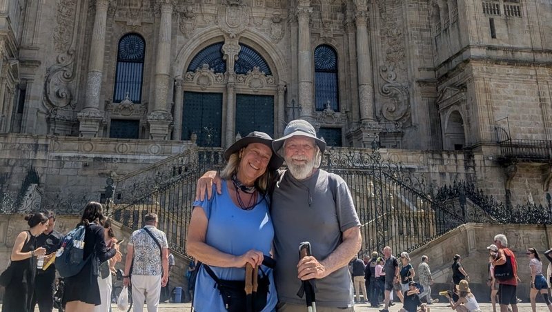 The author and her husband upon reaching the Cathedral of Santiago de Compostela in June of this year. According to tradition, the relics of St. James have been housed in the church for centuries. (Mary Agnes Erlandson Cerny)