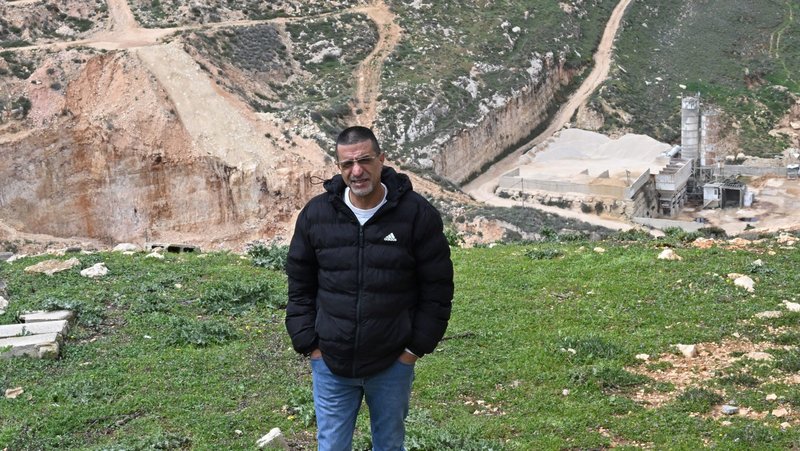 Palestinian Roland Bassir stands on a hill overlooking his and his brother's quarry in the Christian village of Taybeh, West Bank, March 23, 2026. Bassir said he has been unable to open his quarry since Israeli Jewish extremist settlers took control of the area, threatening him with violence if he comes to work in the quarry he has owned for 20 years. (OSV News photo/Debbie Hill)