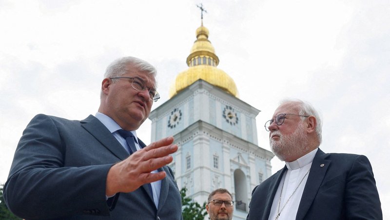 Ukrainian Foreign Minister Andrii Sybiha and Archbishop Paul R. Gallagher, the Vatican foreign minister, speak in front of St. Michael's Cathedral in Kyiv, Ukraine, July 20, 2026, amid Russia's attack on Ukraine. (OSV News photo/Valentyn Ogirenko, Reuters)