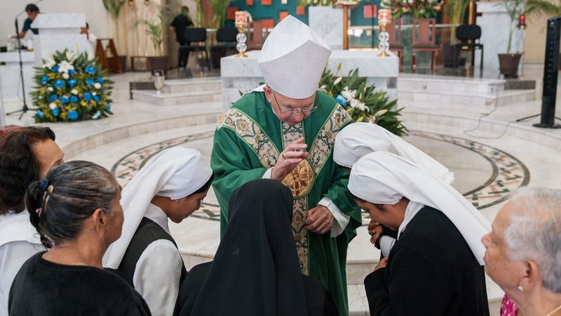 Archbishop José H. Gomez blesses a group of sisters from the Church of the Apparition in Mexico City. (Isabel Cacho)