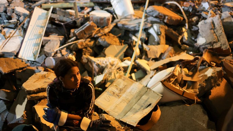 A person looks on amid rubble as rescue efforts continue at the site of a damaged building in Cali, Colombia, Aug. 11, 2026, following a 7.4-magnitude earthquake. The Colombian Bishops' Conference confirmed that Pope Leo XIV, through the papal almoner's office, sent an initial donation of 100,000 euros (more than $115,000) for relief efforts in the country. (OSV News photo/Raquel Cunha, Reuters)