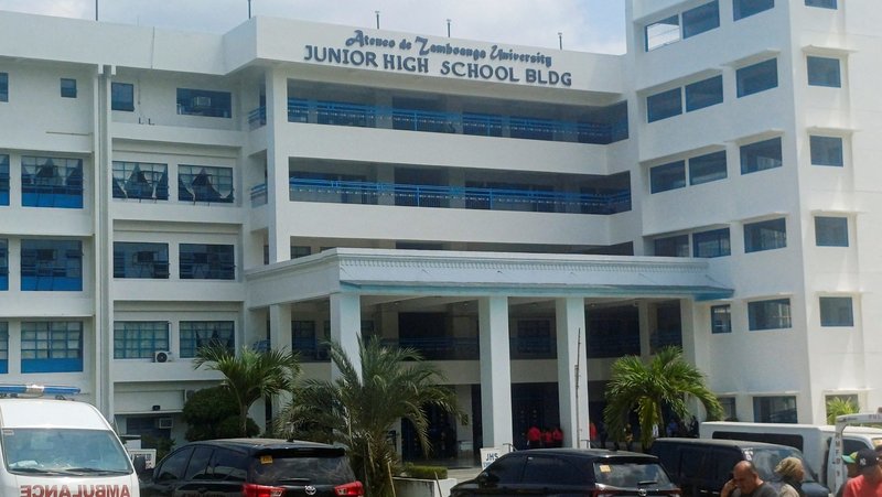 People gather outside Ateneo de Zamboanga University in Zamboanga, southern Philippines, Aug. 18, 2026, after a shooting that resulted in the deaths of at least two people. The shooting at the Jesuit-run school, which saw a student kill a fellow student before killing himself, sparked shock and reignited alarm over juvenile delinquency and campus security. (OSV News photo//Nonoy Lacson, Reuters)