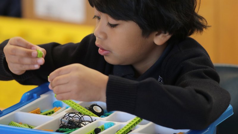 Second-grader Isaiah Carson works in a science, technology, engineering and math program, or STEM, at Assumption of the Virgin Mary School in Pasadena, Calif., Jan. 15, 2025. At the start of a new school year, Catholic educators describe how they are making use of AI and responding to its challenges. (OSV News photo/Bob Roller)