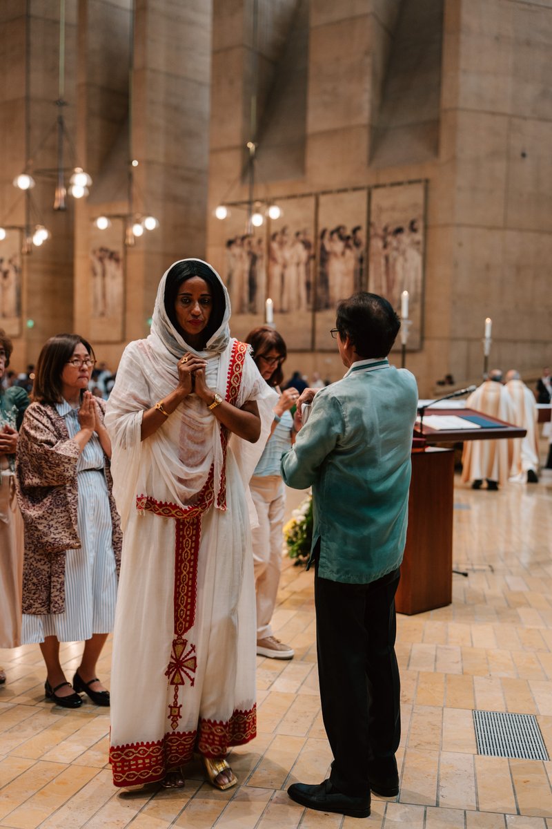 Attendees dressed in cultural, ethnic, and religious clothing participate in the "One Mother, Many Peoples" Mass at the Cathedral of Our Lady of the Angels on Sept. 5. (Peter Lobato)