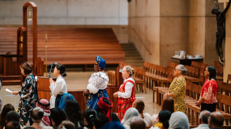 Attendees dressed in cultural, ethnic, and religious clothing participate in the "One Mother, Many Peoples" Mass at the Cathedral of Our Lady of the Angels on Sept. 5. (Peter Lobato)