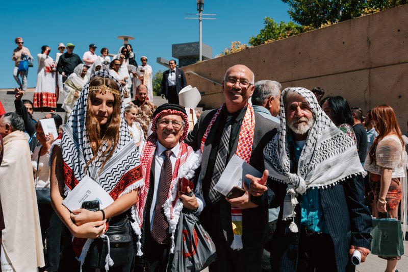 Attendees dressed in cultural, ethnic, and religious clothing pose following in the "One Mother, Many Peoples" Mass at the Cathedral of Our Lady of the Angels on Sept. 5. (Peter Lobato)