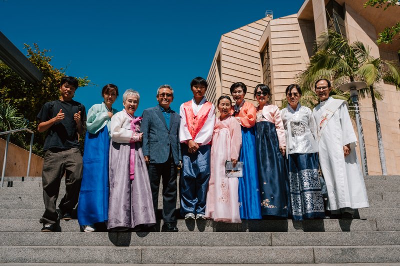 Attendees dressed in cultural, ethnic, and religious clothing pose following in the "One Mother, Many Peoples" Mass at the Cathedral of Our Lady of the Angels on Sept. 5. (Peter Lobato)