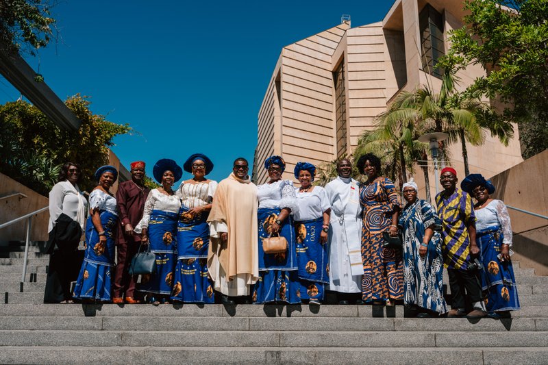 Attendees dressed in cultural, ethnic, and religious clothing pose following in the "One Mother, Many Peoples" Mass at the Cathedral of Our Lady of the Angels on Sept. 5. (Peter Lobato)