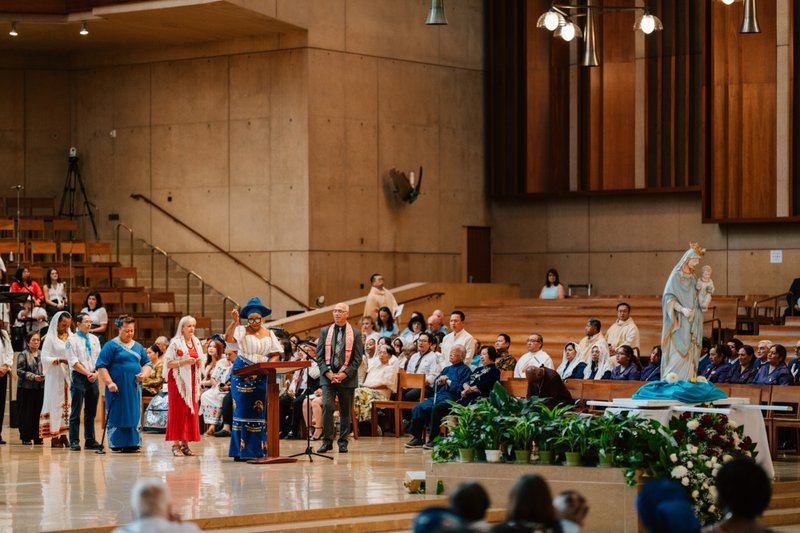 Attendees dressed in cultural, ethnic, and religious clothing participate in the "One Mother, Many Peoples" Mass at the Cathedral of Our Lady of the Angels on Sept. 5. (Peter Lobato)