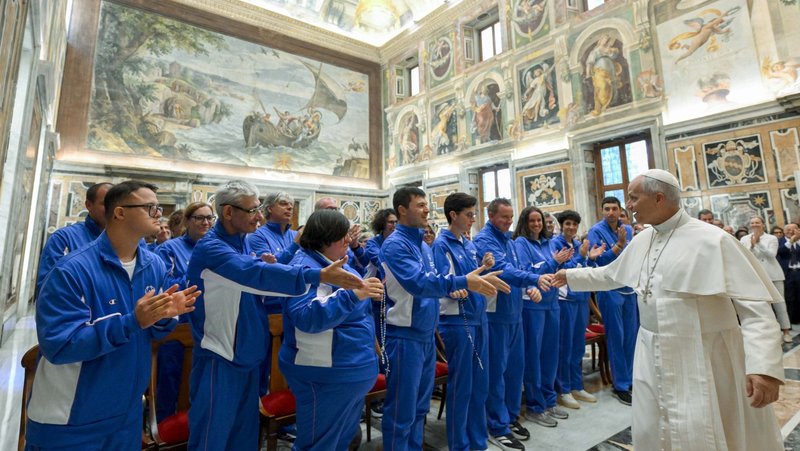 Pope Leo XIV greets a a delegation from the Special Olympics as he arrives for a private audience at the Vatican Sept. 19, 2026. (OSV News photo/Simone Risoluti Vatican Media)