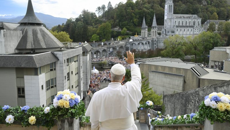 Pope Leo XIV waves to visitors from the hill of the Carmelite Monastery of Lourdes in Lourdes, France, Sept. 27, 2026, before a private meeting with contemplative religious sisters. (CNS photo/Vatican Media)
