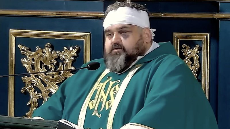 Father Adrian Mantykiewicz, still bearing bandages and bruises from the Sept. 24, 2026, knife attack at the Benedictine sisters' abbey in Jaroslaw, Poland, celebrates Mass Sept. 26 and delivers a message of forgiveness, praying for the attacker and urging respect and solidarity between Poles and Ukrainians. (OSV News screenshot/courtesy Radio Fara)