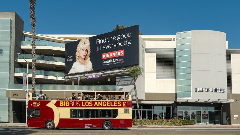 Dolly Parton featured on a billboard in Los Angeles in 2024. (Shutterstock)
