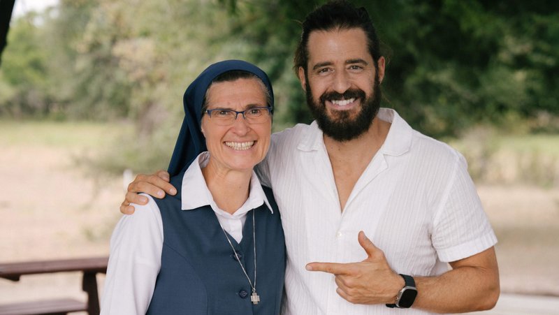Sister Nancy Usselmann, a Daughter of St. Paul and the director of the Pauline Center for Media Studies in Los Angeles, poses on the set of "The Chosen" Aug. 25, 2026, with actor Jonathan Roumie, best known for his role as Jesus in the popular TV series. (OSV News photo/courtesy Come and See Foundation)