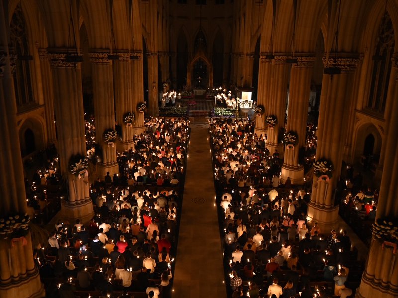 Archbishop Hicks Welcomes New Catholics Into the Church at Easter Vigil Mass at St. Patrick's Cathedral