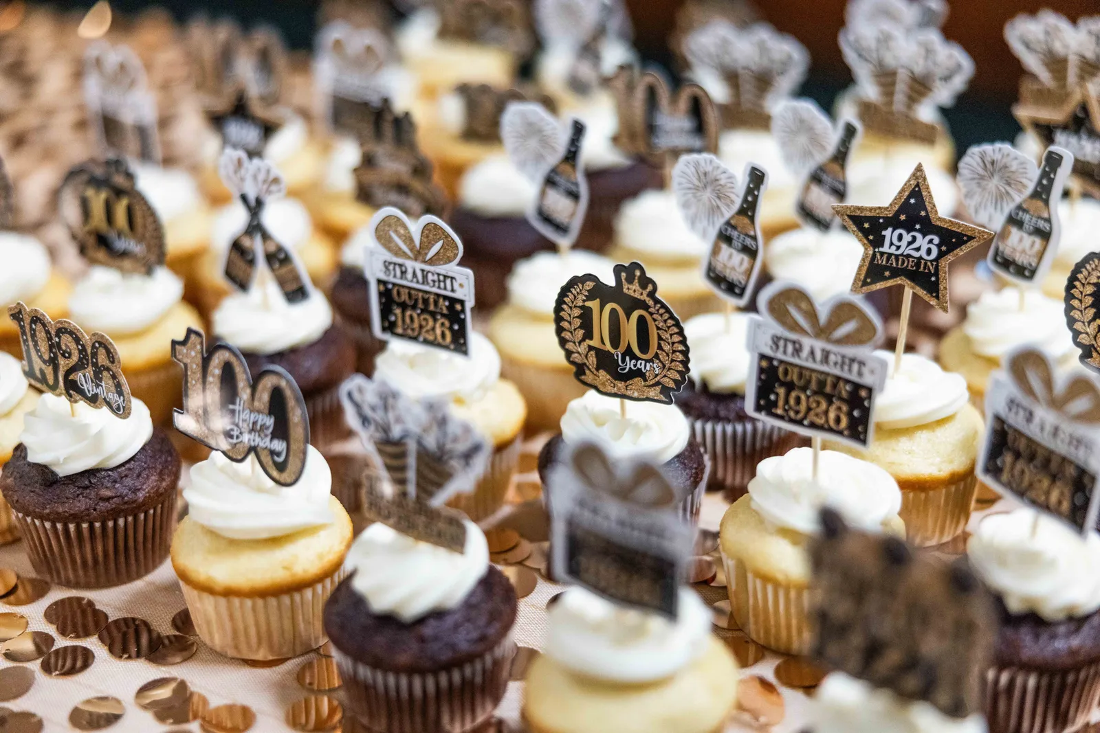 Following a Mass marking the 100th anniversary of St. James Church in Mount Rainier, Maryland, on Oct. 25, 2026, people gathered for a reception in the parish hall that included cupcakes decorated for the anniversary. (Catholic Standard photo by Andrew Biraj)