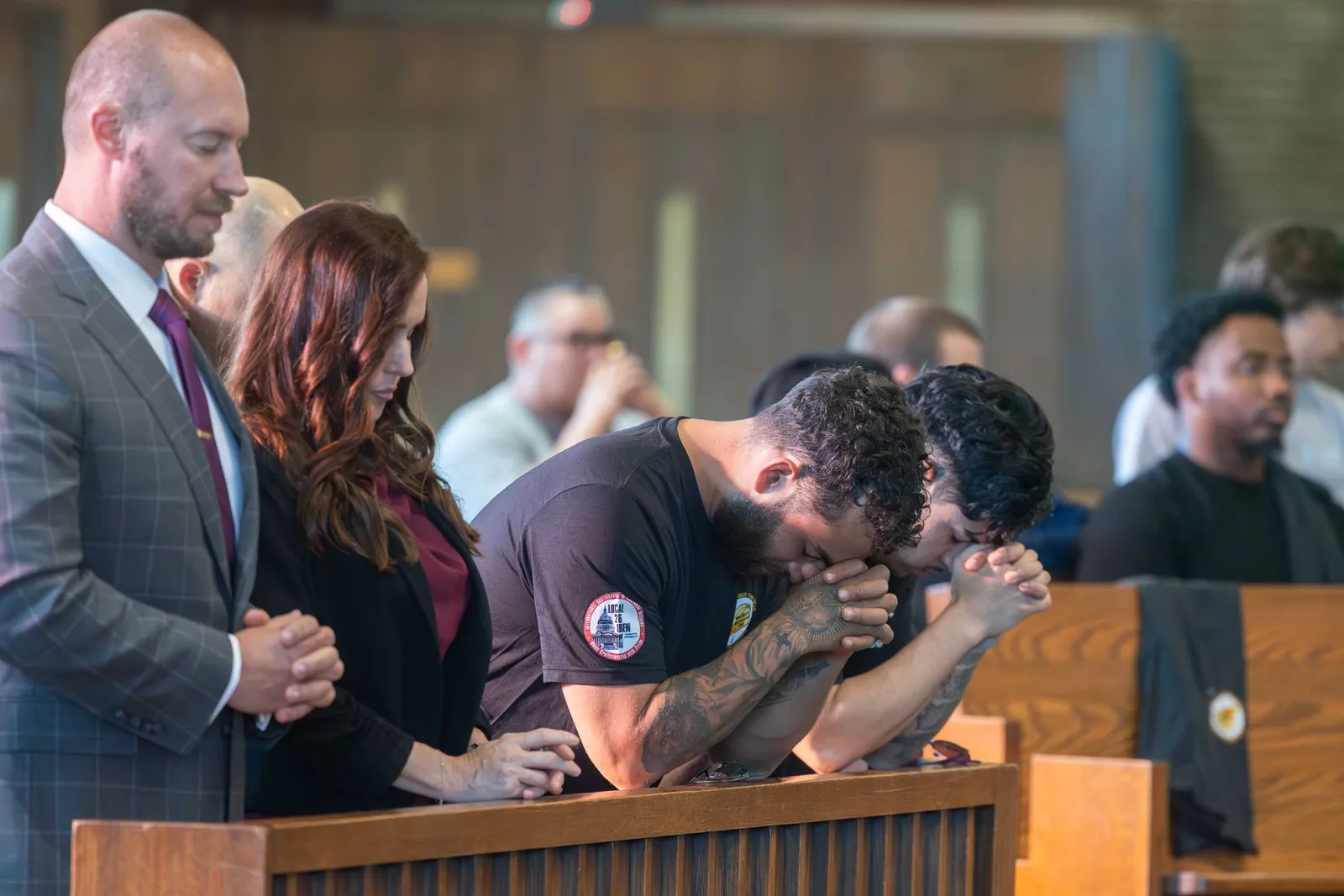 People pray during the fifth annual Workers Memorial Day Mass on April 23, 2026 at St. Camillus Church in Silver Spring, Maryland. (Catholic Standard photos by Mihoko Owada)