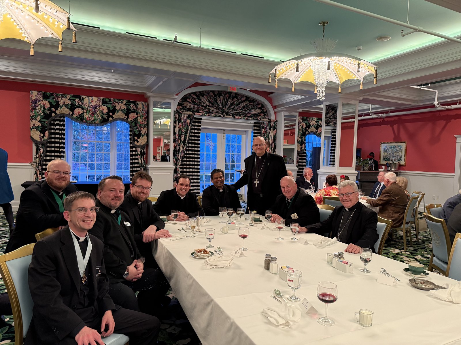 The archbishop gathers with clergy after the opening banquet May 20 at the Michigan Knights of Columbus state convention on Mackinac Island at the Grand Hotel.