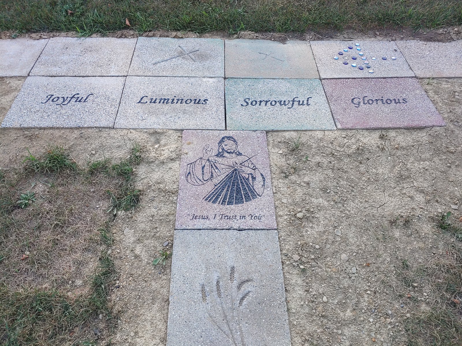 Etched into the stone pavers are symbols and images related to the mysteries of the rosary. The parish hopes the newly discovered path will give glory to God and encourage future parishioners to honor the Blessed Virgin Mary.