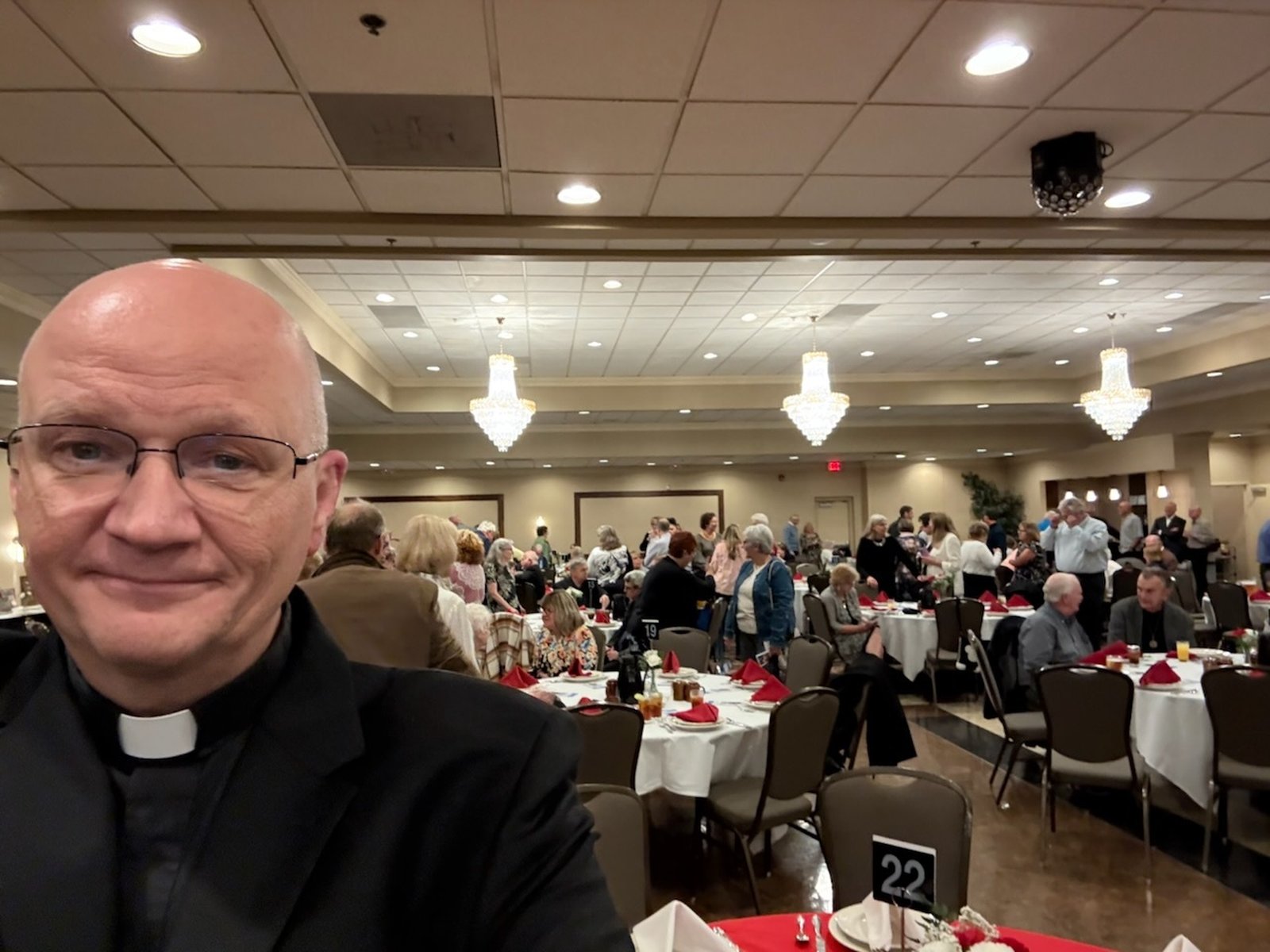 Archbishop Weisenburger attends a Polish lunch served following St. John Paul II's centennial Mass.