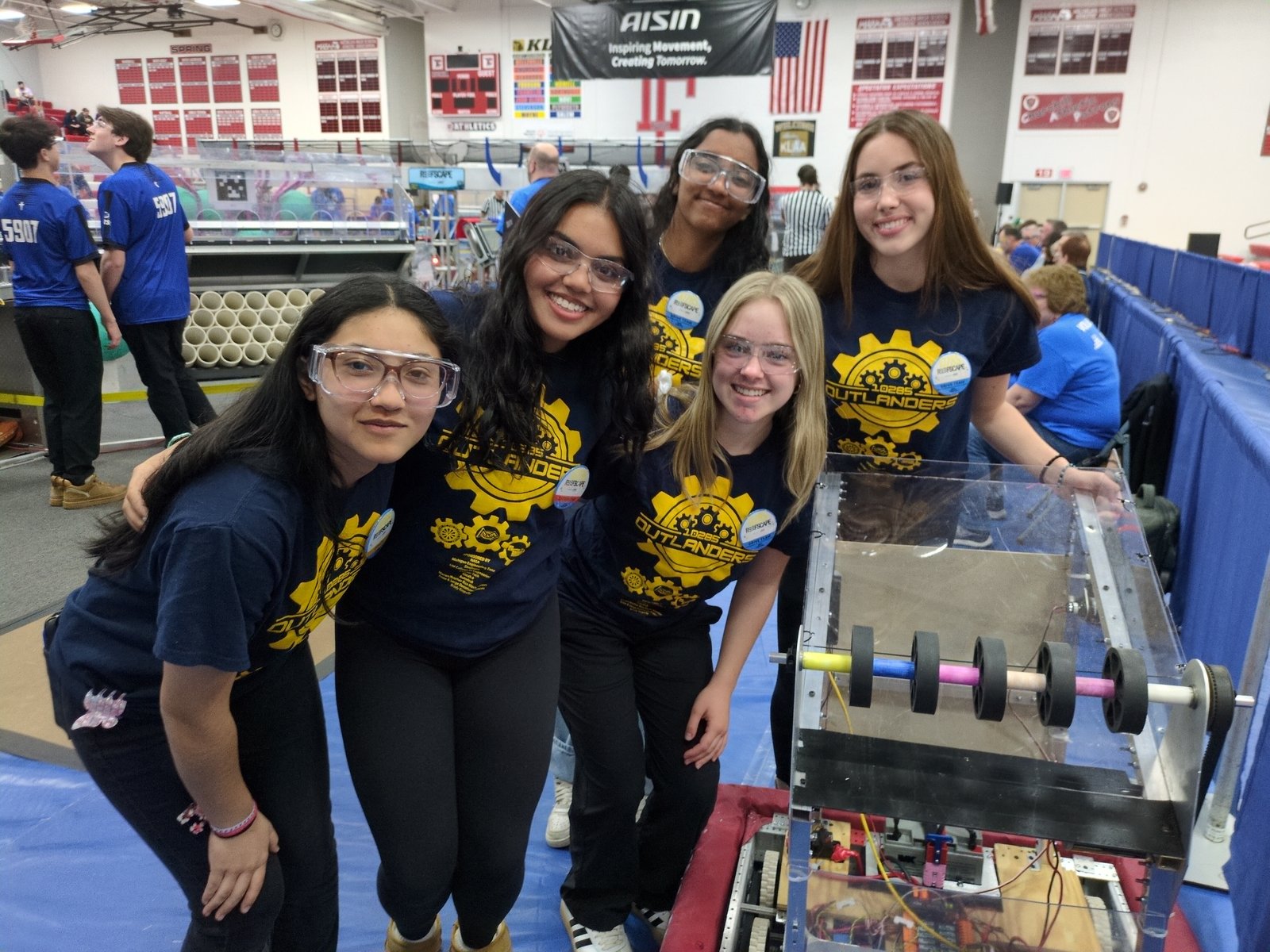 Members of Academy of the Sacred Heart’s new robotics team compete at a tournament in March, 2025. The team earned a berth in the state competition in its first season. (Submitted photo)