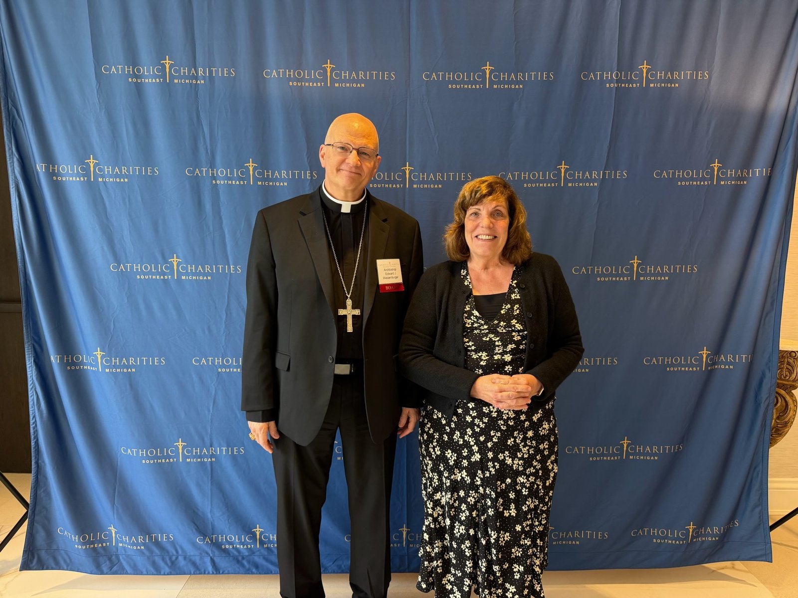 With Paula Dixon, pastoral associate for evangelical charity at the National Shrine of the Little Flower Basilica Parish in Royal Oak.