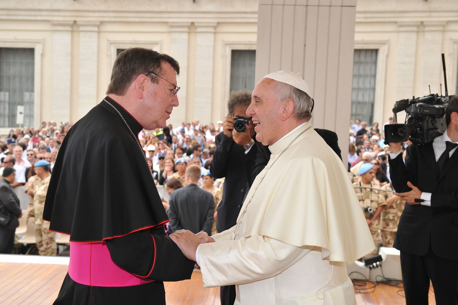 Archbishop Allen H. Vigneron greets Pope Francis during an audience at the Vatican in 2014, a year after the pontiff's election to the See of Peter.