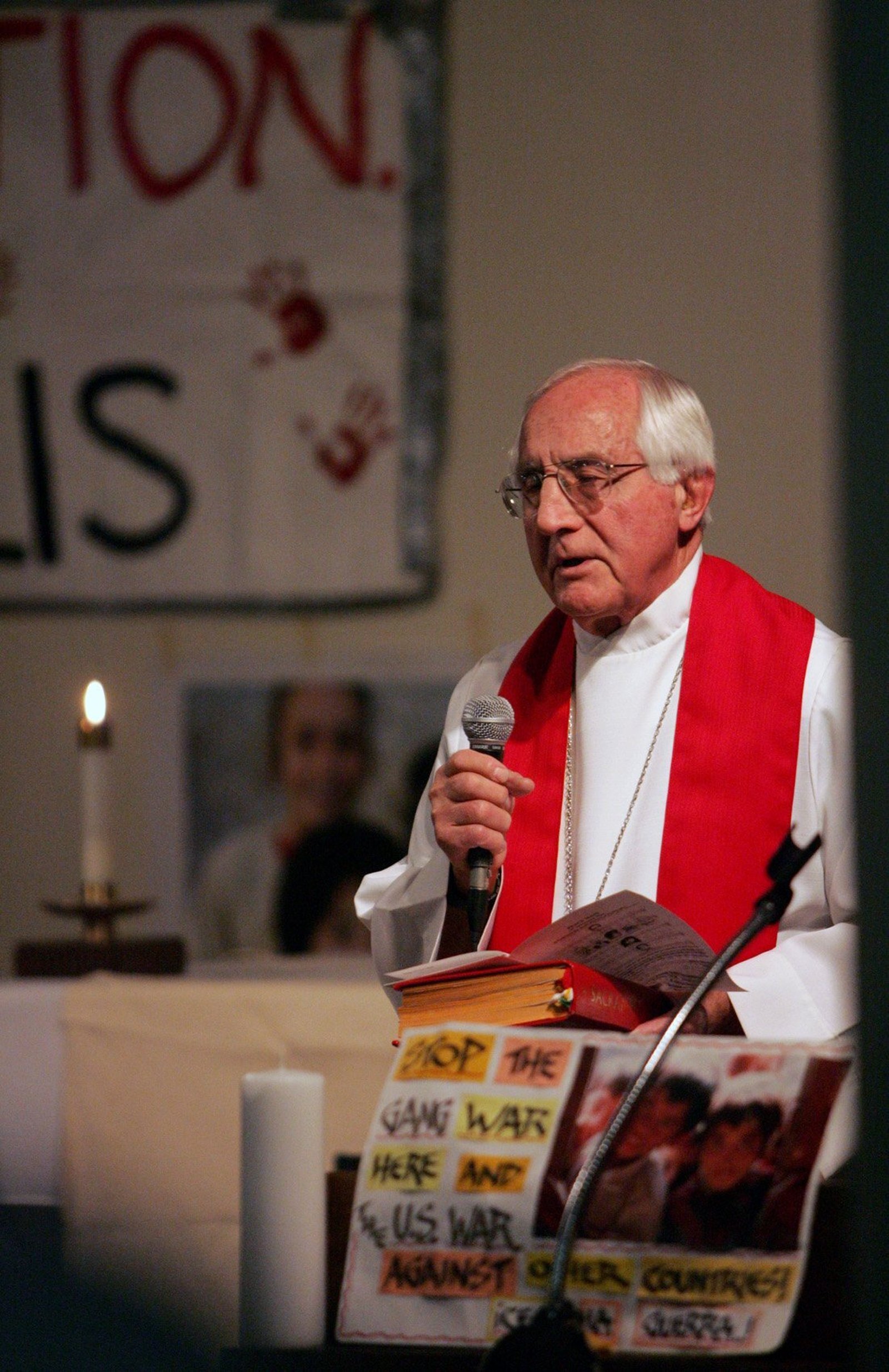 Bishop Gumbleton celebrates a Mass for peace in the basement chapel of St. Aloysius Church in Washington in 2004. In 1979, Bishop Gumbleton was one of three U.S. clergy who were given the chance to spend Christmas with American hostages at the U.S. embassy in Tehran. (CNS photo by Nancy Wiechec)