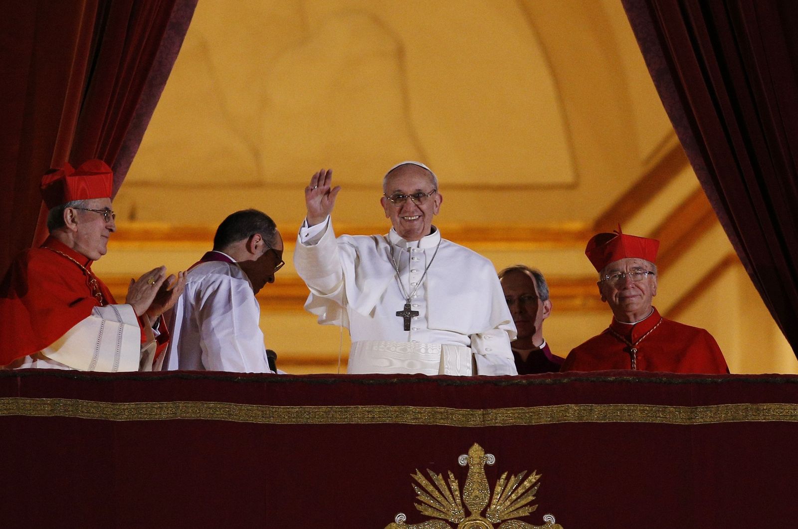 Pope Francis appears for the first time on the central balcony of St. Peter's Basilica at the Vatican March 13. Cardinal Jorge Mario Bergoglio of Argentina was elected the 266th Roman Catholic pontiff. He is the first Jesuit and first Latin American pope. (CNS photo/Paul Haring)