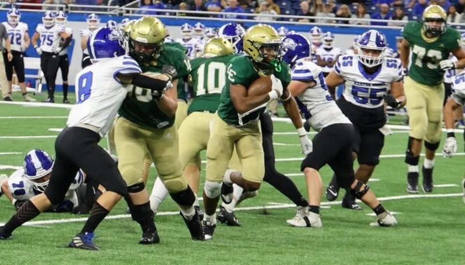 Lumen Christi’s junior running back Kadale Williams added 213yards on 24 carries to his season’s 1,000 yards-plus rushing total and scored a pair of touchdowns in the Titans’ 21-14 decision over Harper Creek in the Prep Bowl. (Photo courtesy of Rick Bradley)
