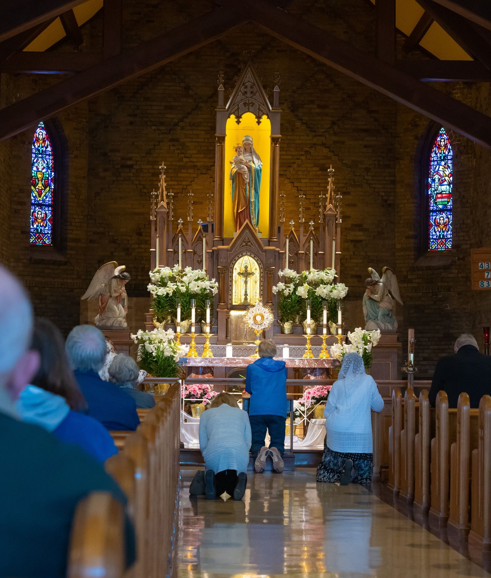 Worshippers are pictured in a file photo praying during adoration of the Blessed Sacrament at the National Shrine of Our Lady of Good Help in Champion, Wis. Green Bay Bishop David L. Ricken announced April 20, 2023, that the shrine has changed its name to the National Shrine of Our Lady of Champion. In addition, a solemnity Mass will now be celebrated each year on Oct. 9, the anniversary of the 1859 apparitions of the Blessed Virgin Mary to Adele Brise. (OSV News photo/Sam Lucero)