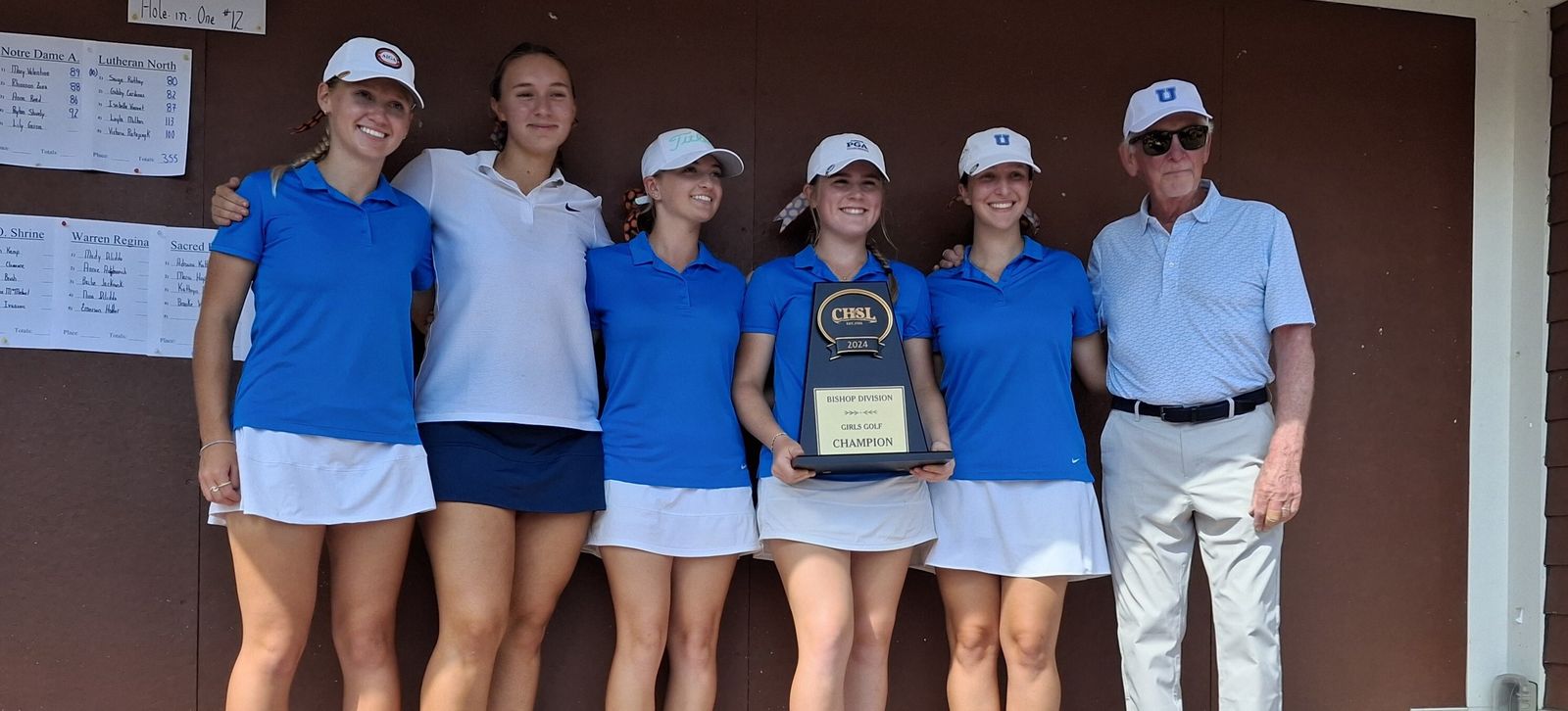 St. Ursula takes the CHSL Bishop Division girls golf trophy south of the border for the second consecutive time. Showing it off are, left to right, Sydney Socha, Kennedy Donnelly, Lindsey Kornowa, Emma Myers, Olivia Rodgers and coach Jim McGowan.