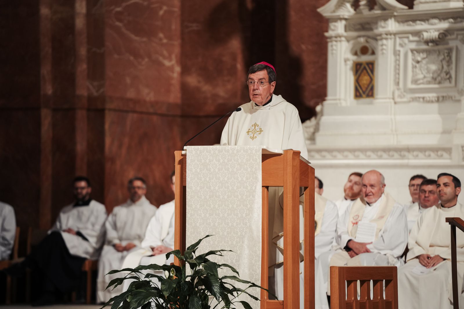 Eucharistic faith is a "humble faith," the archbishop explained in his homily. Because Jesus humbled himself on the cross and in the form of bread and wine in the Eucharist, those who worship him are called to likewise humble themselves before the love of God, he said.