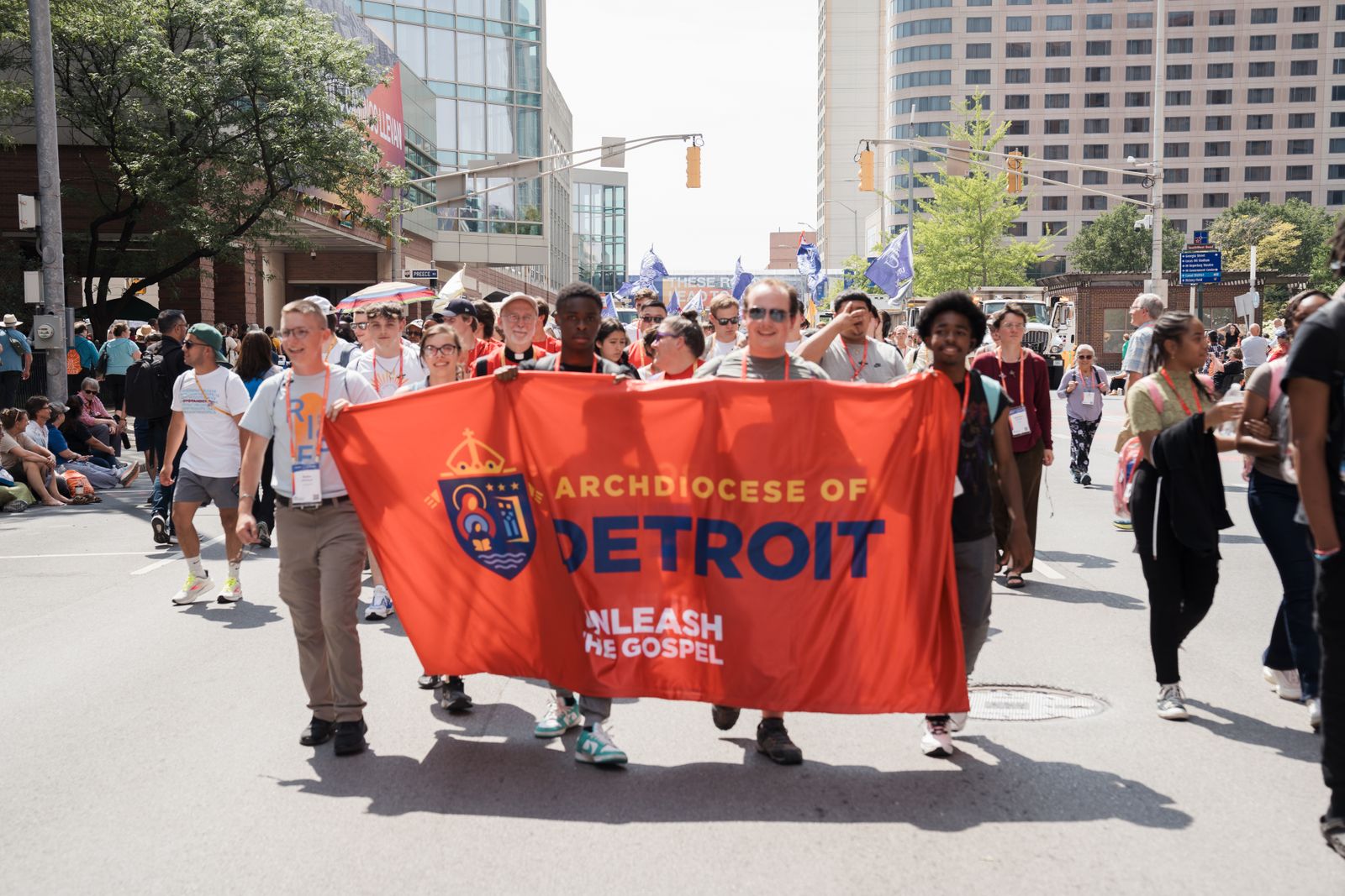 Detroit pilgrims make their way through the streets of Indianapolis during the start of the National Eucharistic Congress in July. (Leah Butalid | Detroit Catholic)