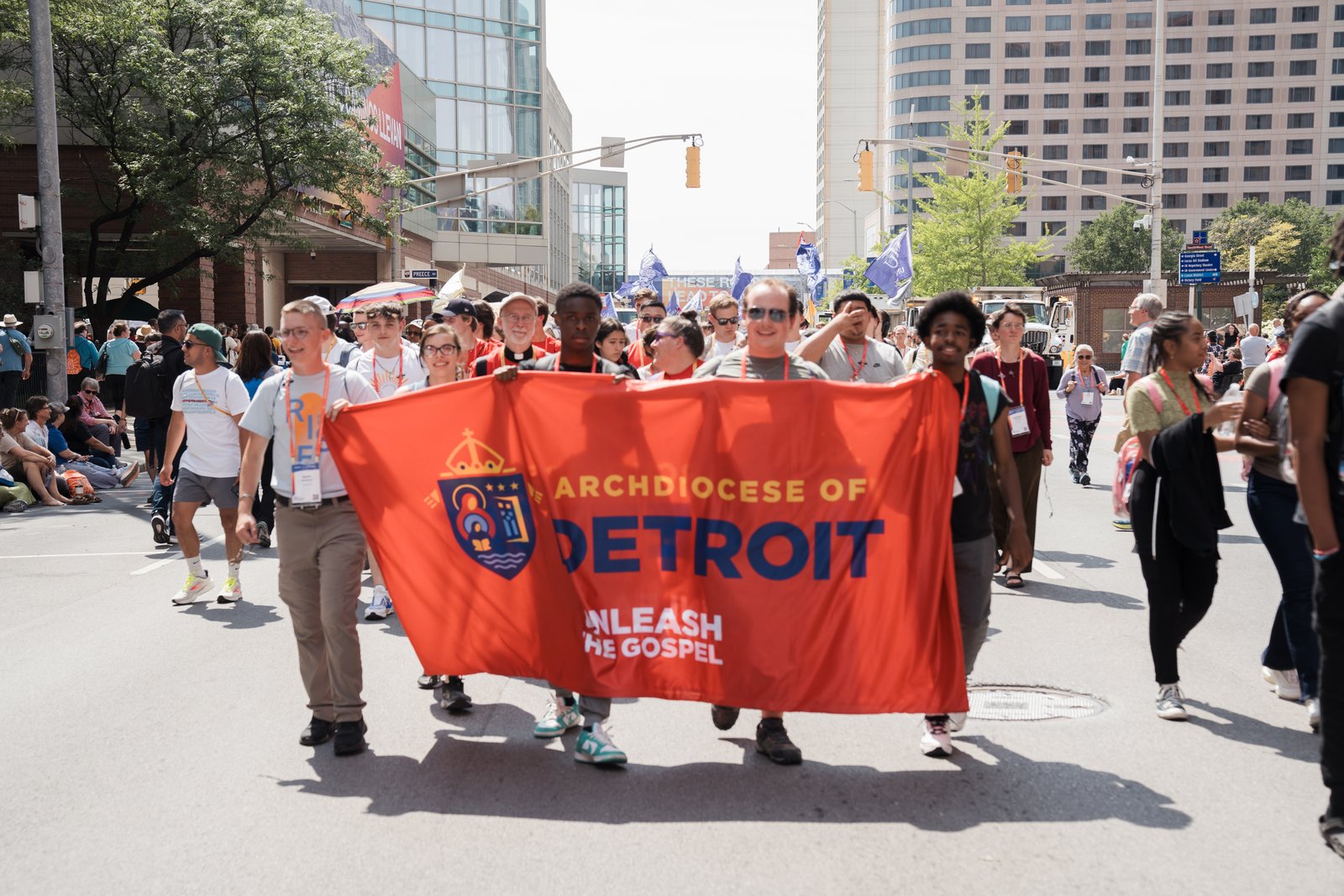 Detroit pilgrims make their way through the streets of Indianapolis during the start of the National Eucharistic Congress in July. (Leah Butalid | Detroit Catholic)