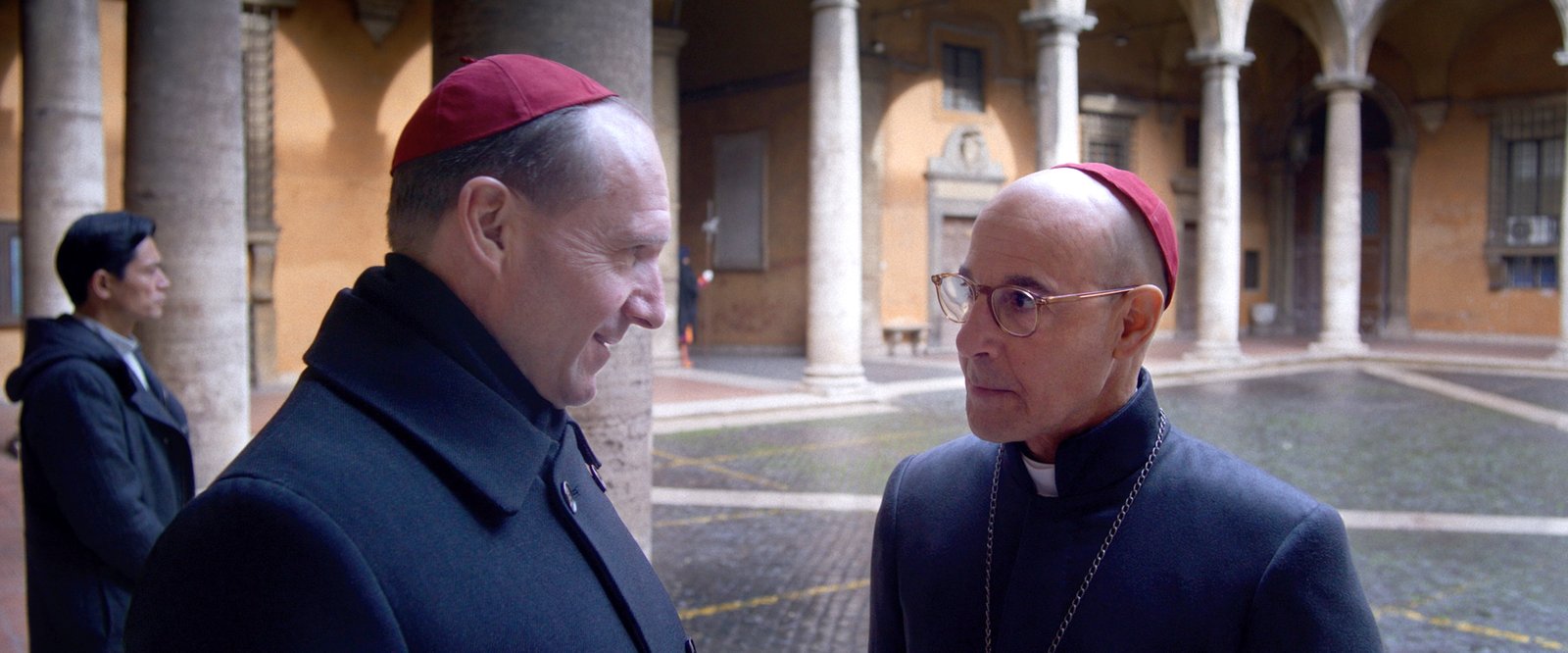 Ralph Fiennes as Cardinal Lawrence and Stanley Tucci as Cardinal Bellini star in a scene from the movie "Conclave." (OSV News photo/Focus Features)