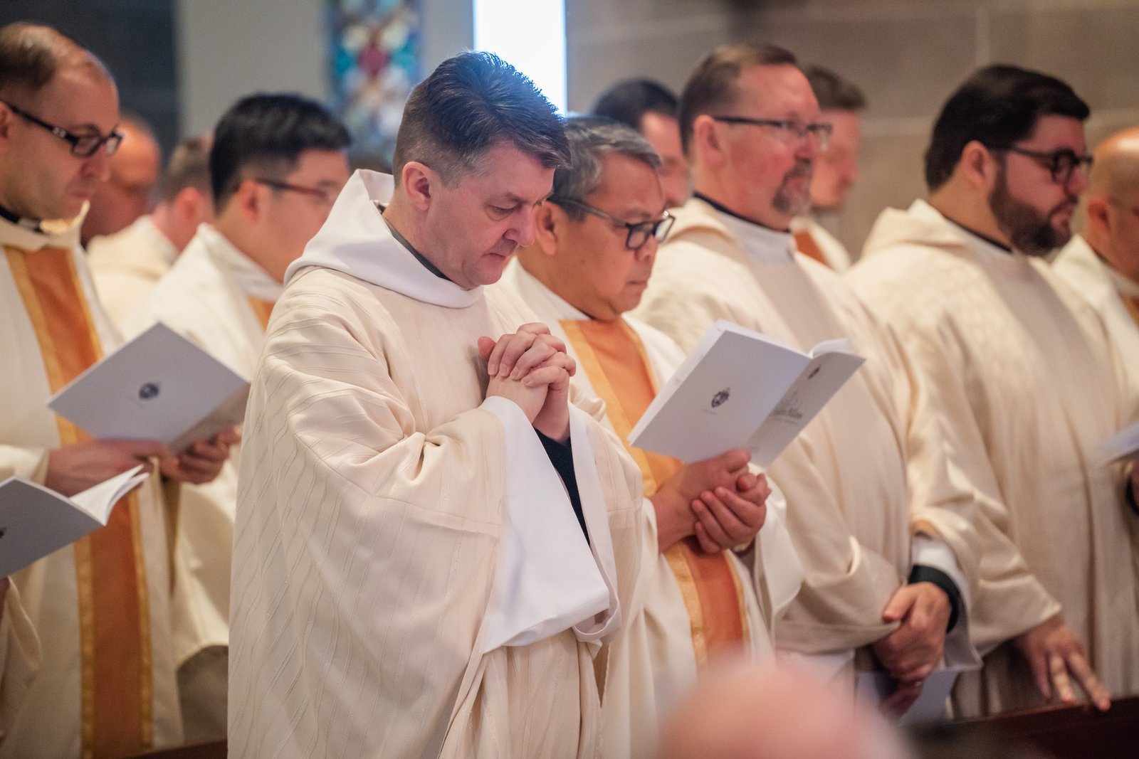 Priests of the Archdiocese of Detroit renew their priestly promises on Holy Thursday, which commemorates Christ's institution of the priesthood during the Last Supper.