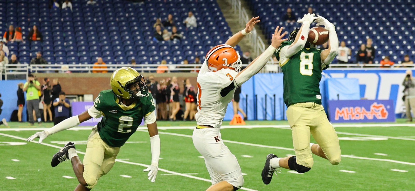 Lumen Christi’s junior Johnny Walters (8) played a key role on both sides of the scrimmage line, catching a 23-yard pass for a touchdown and making a late game interception that sewed up the Division 6 title for the Titans.