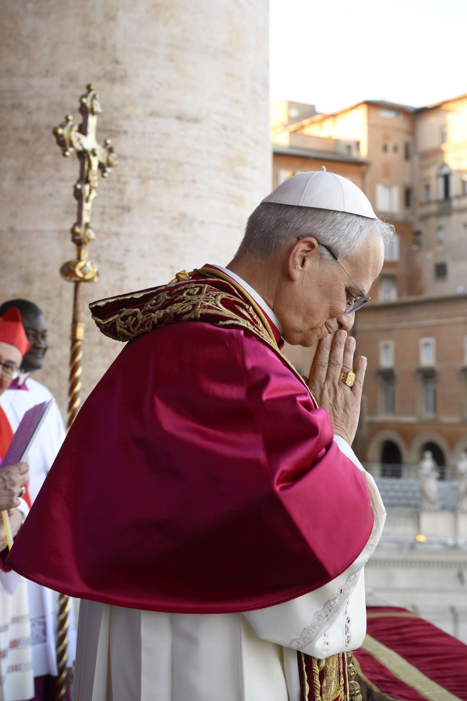 Pope Leo XIV, the former Cardinal Robert F. Prevost, bows as he greets the crowds in St. Peter's Square at the Vatican after his election as pope May 8, 2025. The new pope was born in Chicago but attended seminary high school in western Michigan, at St. Augustine Seminary High School in Holland. (CNS photo/Vatican Media)