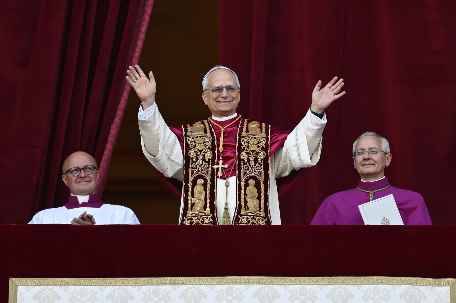 Pope Leo XIV, the former Cardinal Robert F. Prevost, waves to the crowds in St. Peter's Square at the Vatican after his election as pope May 8, 2025. The new pope was born in Chicago. (CNS photo/Vatican Media)