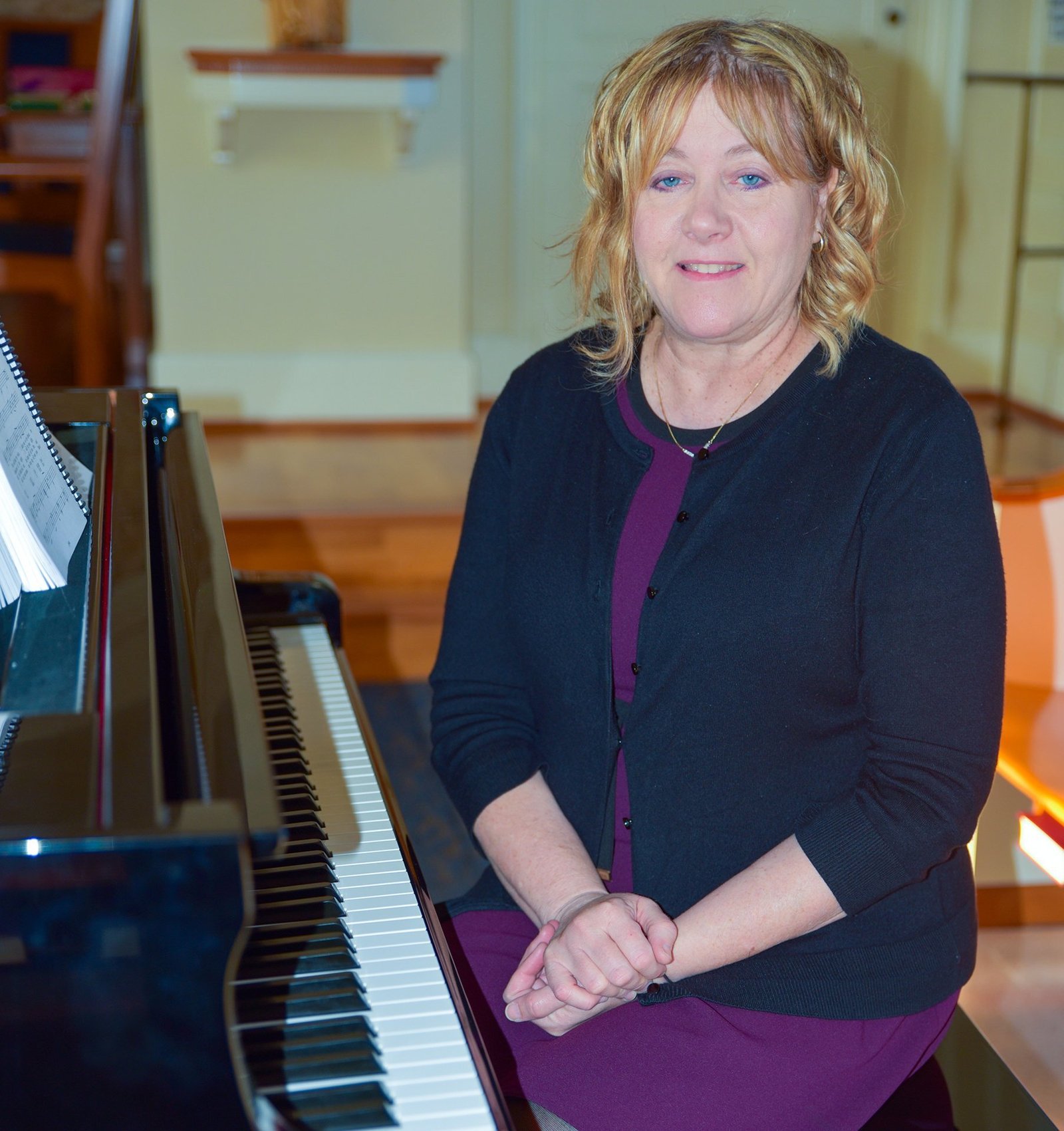 Kimberly Hess, an organist at Arlington National Cemetery in Virginia, poses for a photo in October 2024 in Sacred Heart of Mary Chapel at Marymount University in Arlington. (OSV News file photo/Ann M. Augherton, The Arlington Catholic Herald)
