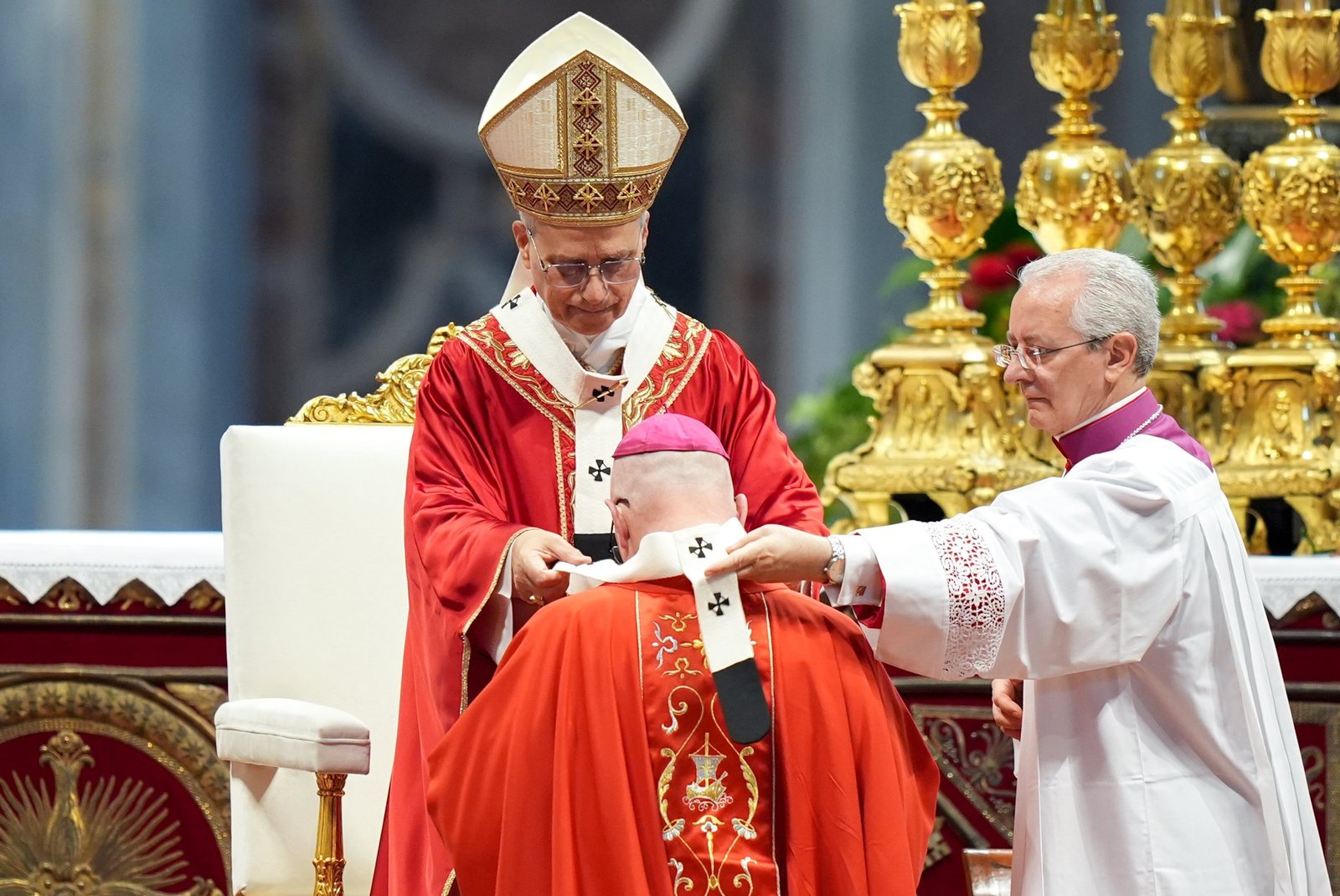 Pope Leo XIV presents the pallium to Archbishop Edward J. Weisenburger of Detroit during Mass in St. Peter’s Basilica at the Vatican June 29, 2025, the feast of Sts. Peter and Paul. The pallium symbolizes the archbishop’s authority and unity with the pope. (CNS photo/Lola Gomez)