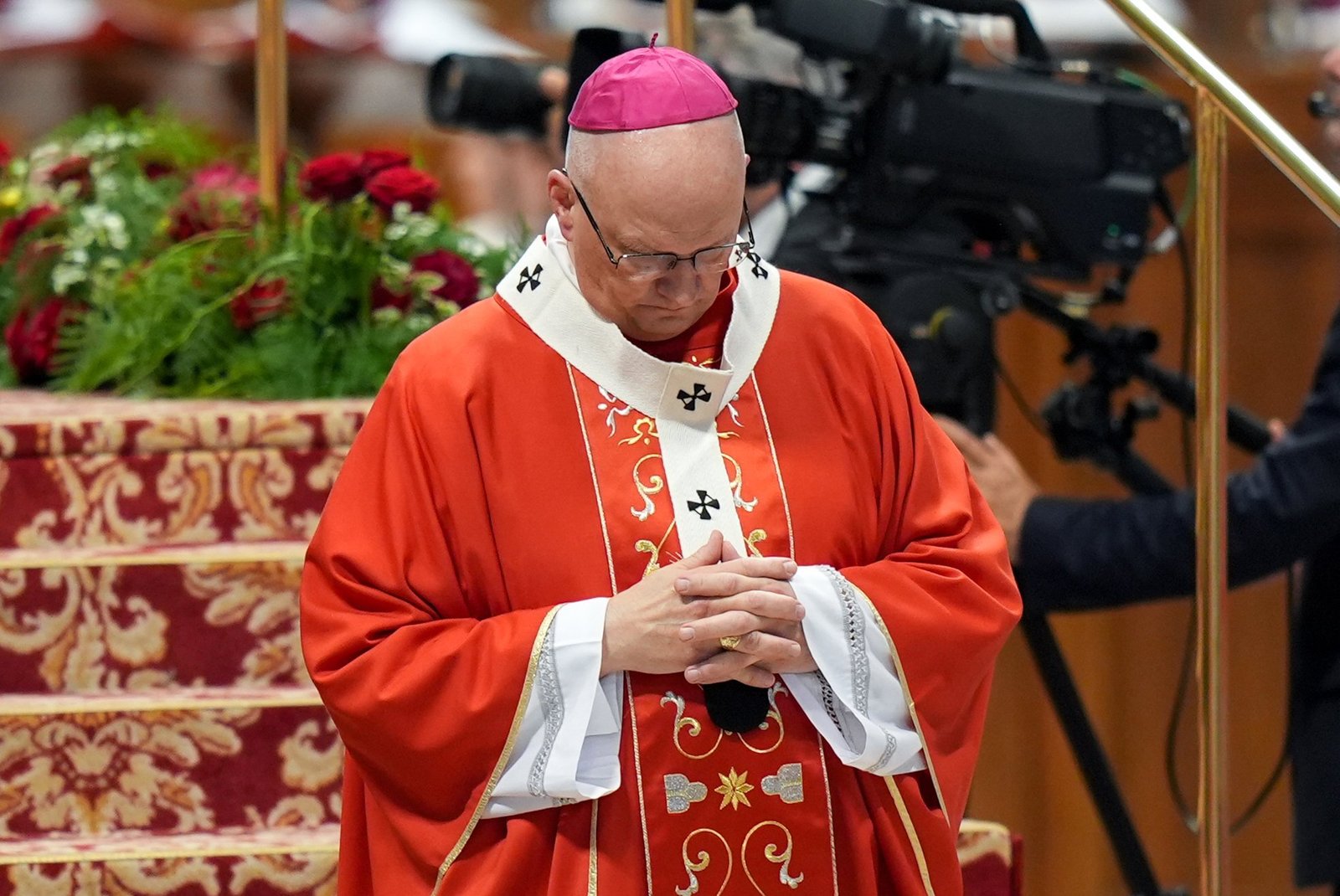 Archbishop Weisenburger walks back to his seat after receiving the pallium from Pope Leo XIV during Mass in St. Peter’s Basilica at the Vatican June 29, 2025, the feast of Sts. Peter and Paul. (CNS photo/Lola Gomez)