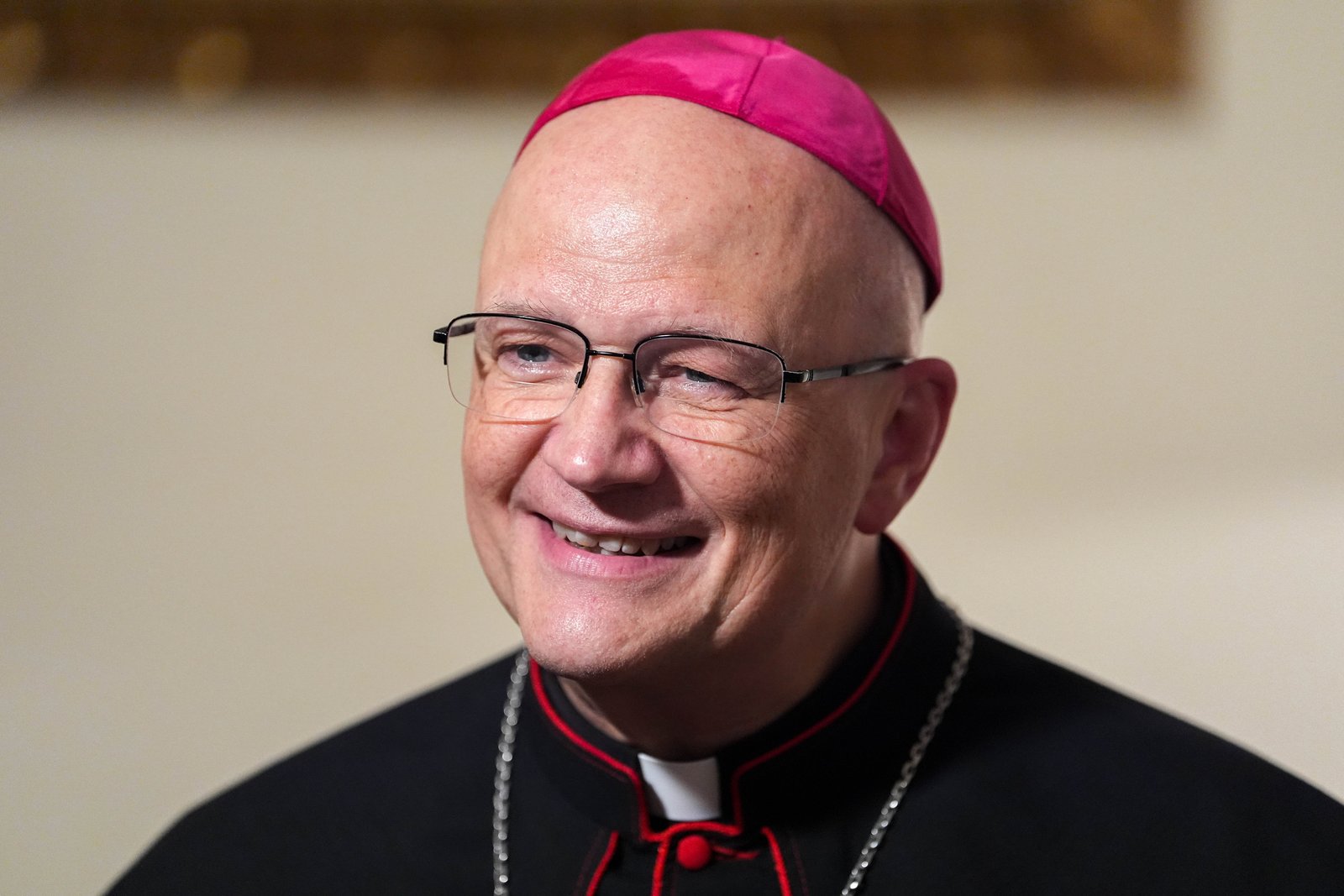 Archbishop Edward J. Weisenburger smiles during an interview with Catholic News Service at the Pontifical North American College in Rome shortly after receiving his pallium. (Lola Gomez/CNS photo)