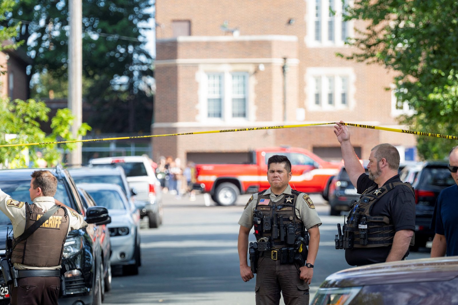 First responders block of the crime scene following a shooting at Annunciation Catholic School in Minneapolis Aug. 27, 2025. The Richfield Police Department is reporting there are up to 20 victims; two children and the suspected shooter are dead. (OSV News photo/Ben Brewer, Reuters)