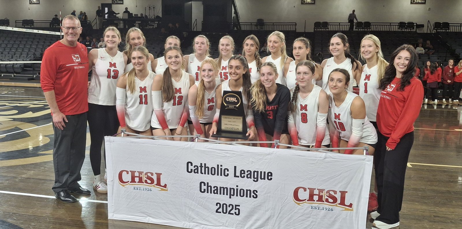 Orchard Lake St. Mary’s, with new coach Ross Talbott (left), won its fourth consecutive CHSL Cardinal Division volleyball championship.