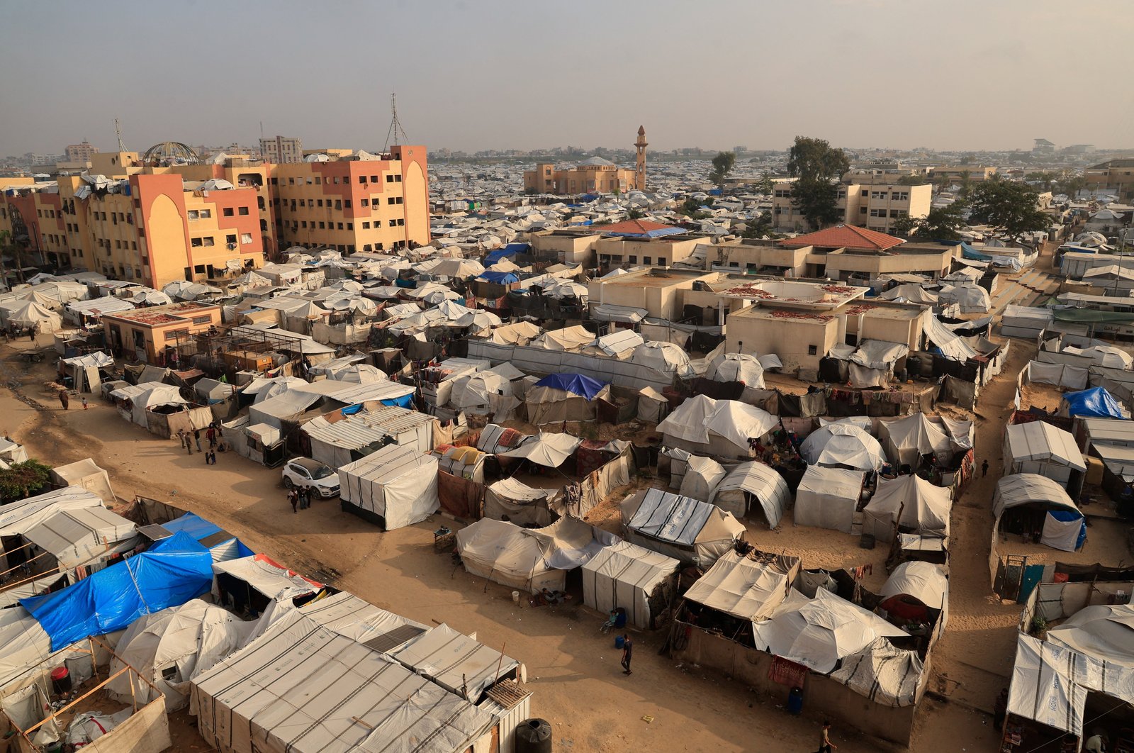 Tents sheltering displaced Palestinians are seen Nov. 24, 2025, set up around Al-Aqsa University campus in Khan Younis, in the southern Gaza Strip. More than 80 percent of the homes in Gaza have been destroyed, Cardinal Pizzaballa said. (OSV News photo/Haseeb Alwazeer, Reuters)