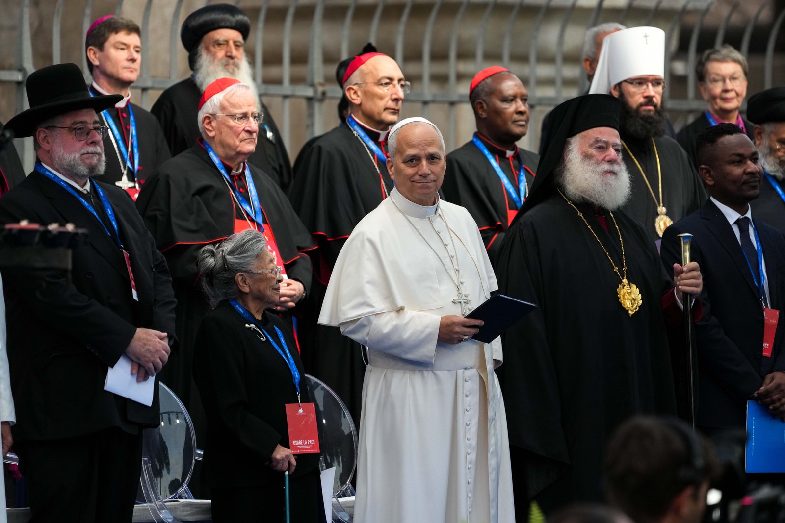 Pope Leo XIV joins religious leaders at the International Meeting of Dialogue and Prayer for Peace near the Colosseum in Rome Oct. 28, 2025. In his message for World Peace Day, the pope said religious leaders must refute "forms of blasphemy that profane the holy name of God" by using religion to defend war. (CNS photo/Lola Gomez)