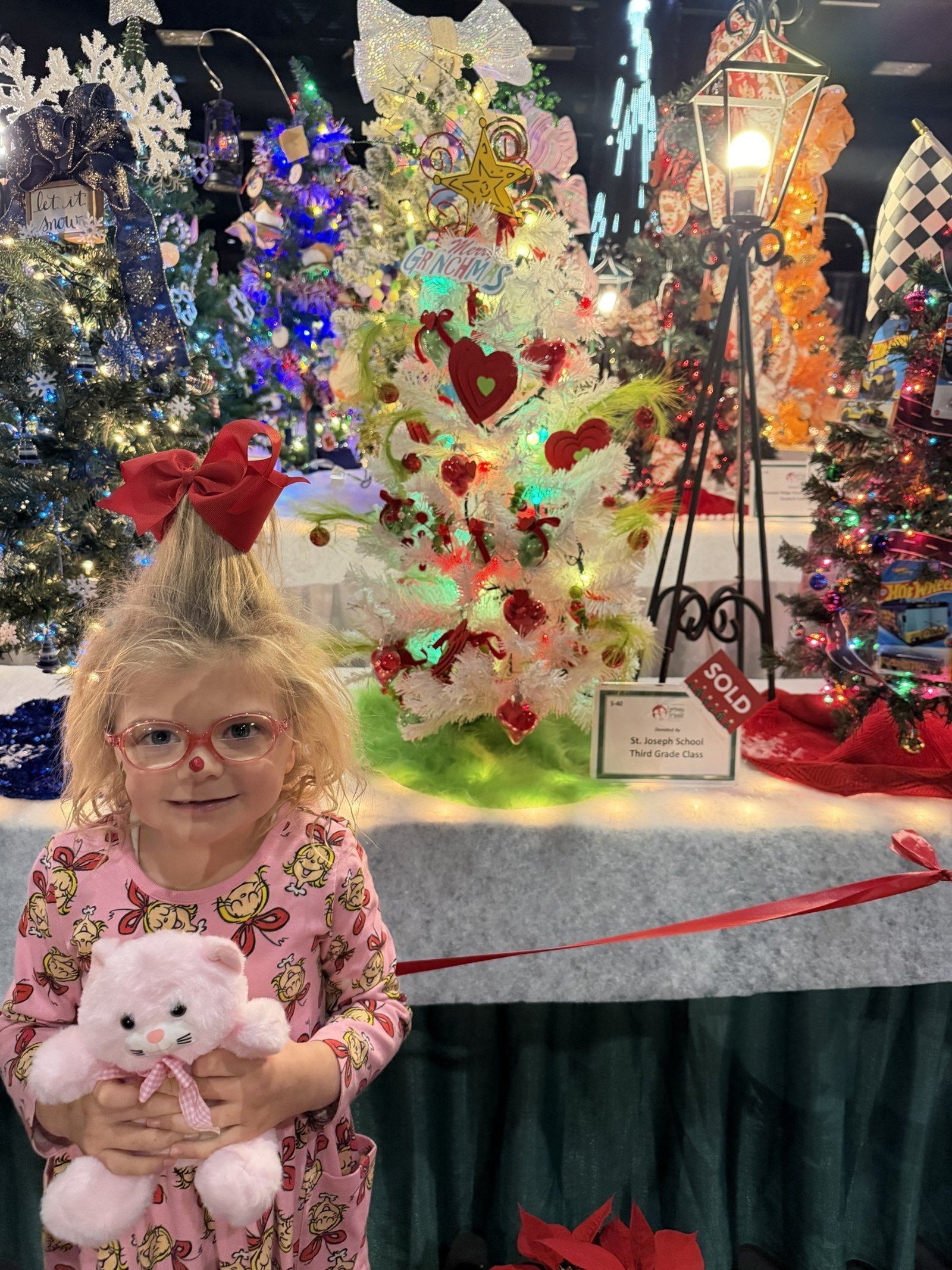 Hattie Halter, alias Cindy-Lou Who, poses in an undated photo. Now a third-grader, she and her classmates at St. Joseph School in Knoxville, Tenn., created a Grinch-themed Christmas tree for the Fantasy of Trees benefit Nov. 26-30 for East Tennessee Children's Hospital and its pediatric cancer-treatment program. Hattie, who was diagnosed with acute myeloid leukemia when she was 9 months old, is now cancer free seven years later. (OSV News photo/courtesy Melissa Halter)